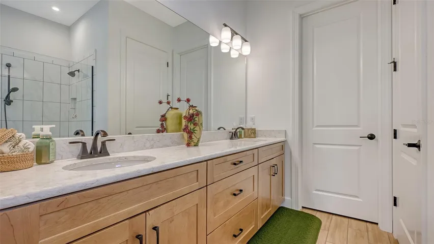 Primary en suite with double vanity, private water closet