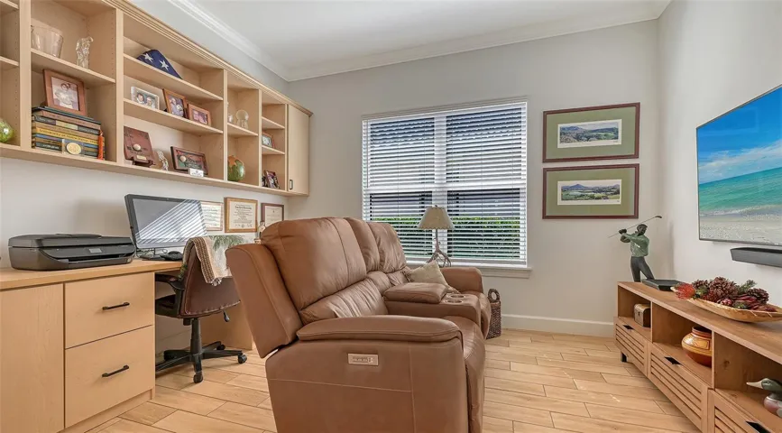 Office/den with built-in desk and storage