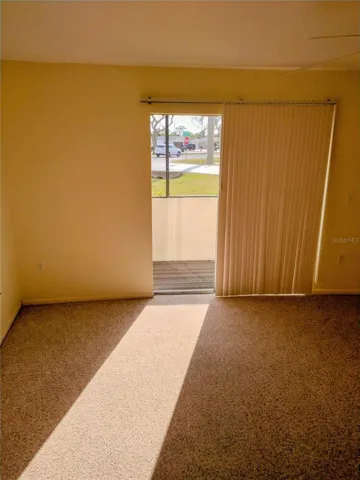 BEDROOM HAS SLIDING DOOR TO SCREENED LANAI