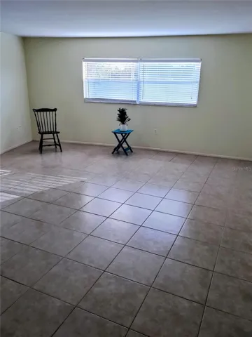 LOTS OF NATURAL LIGHT IN LIVING ROOM