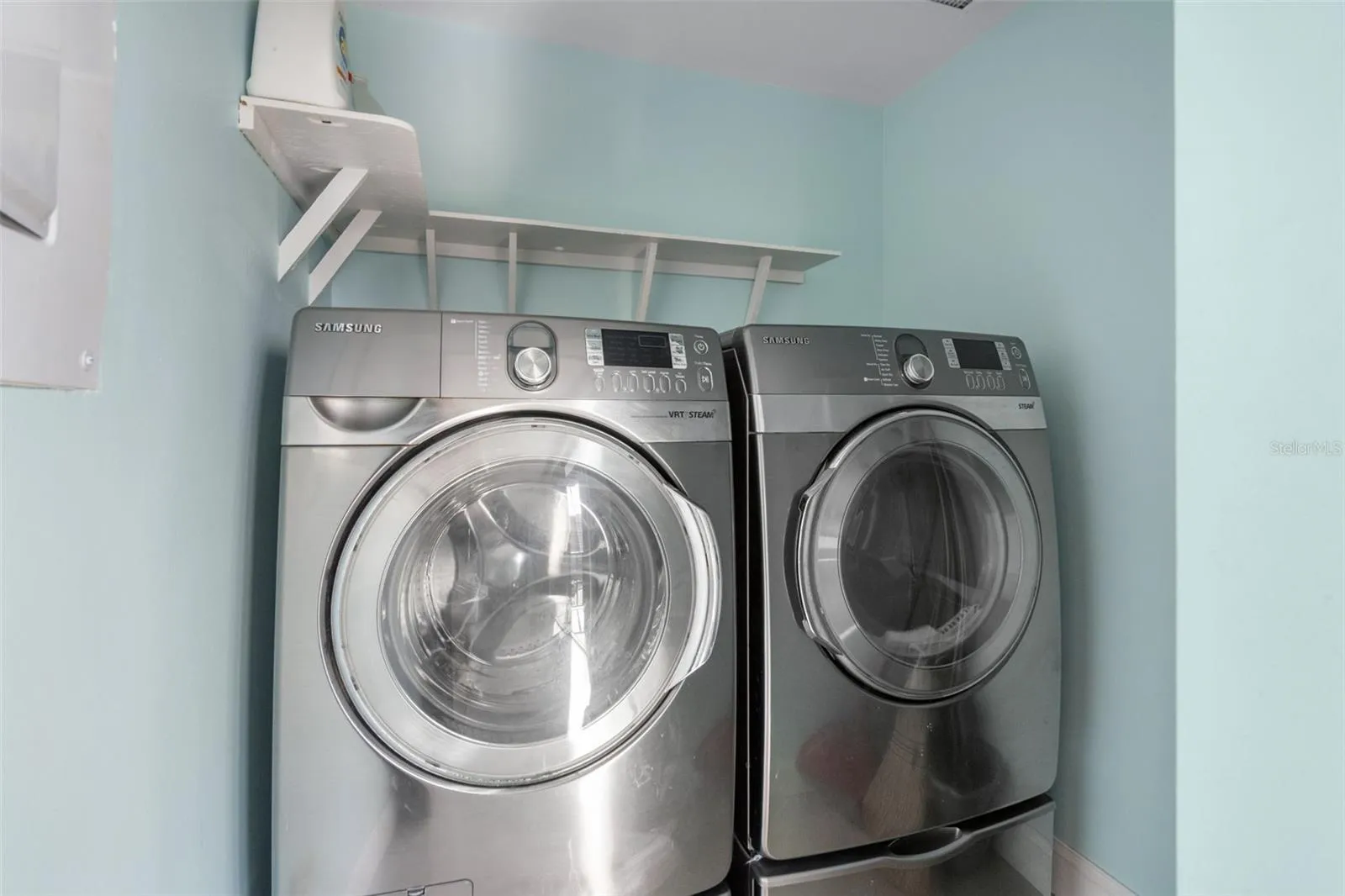 Laundry closet conveniently located in kitchen area