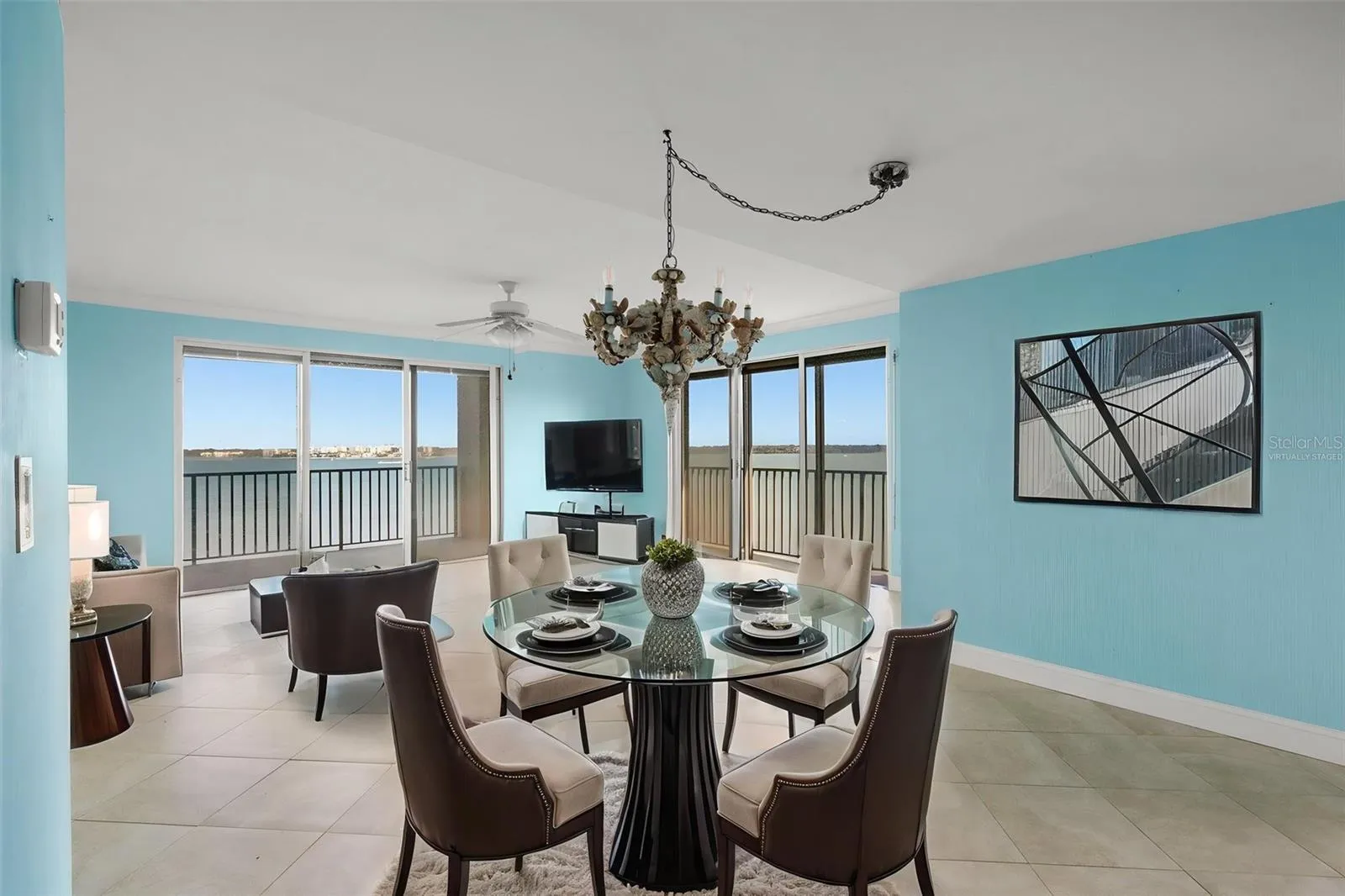 Virtually staged west living room and dining area