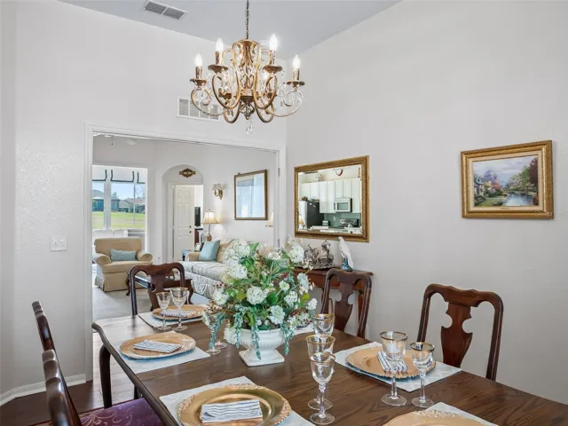 Dining area w/Designer Chandelier