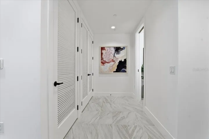 UTILITY CLOSET, HALF BATH AND LAUNDRY ROOM