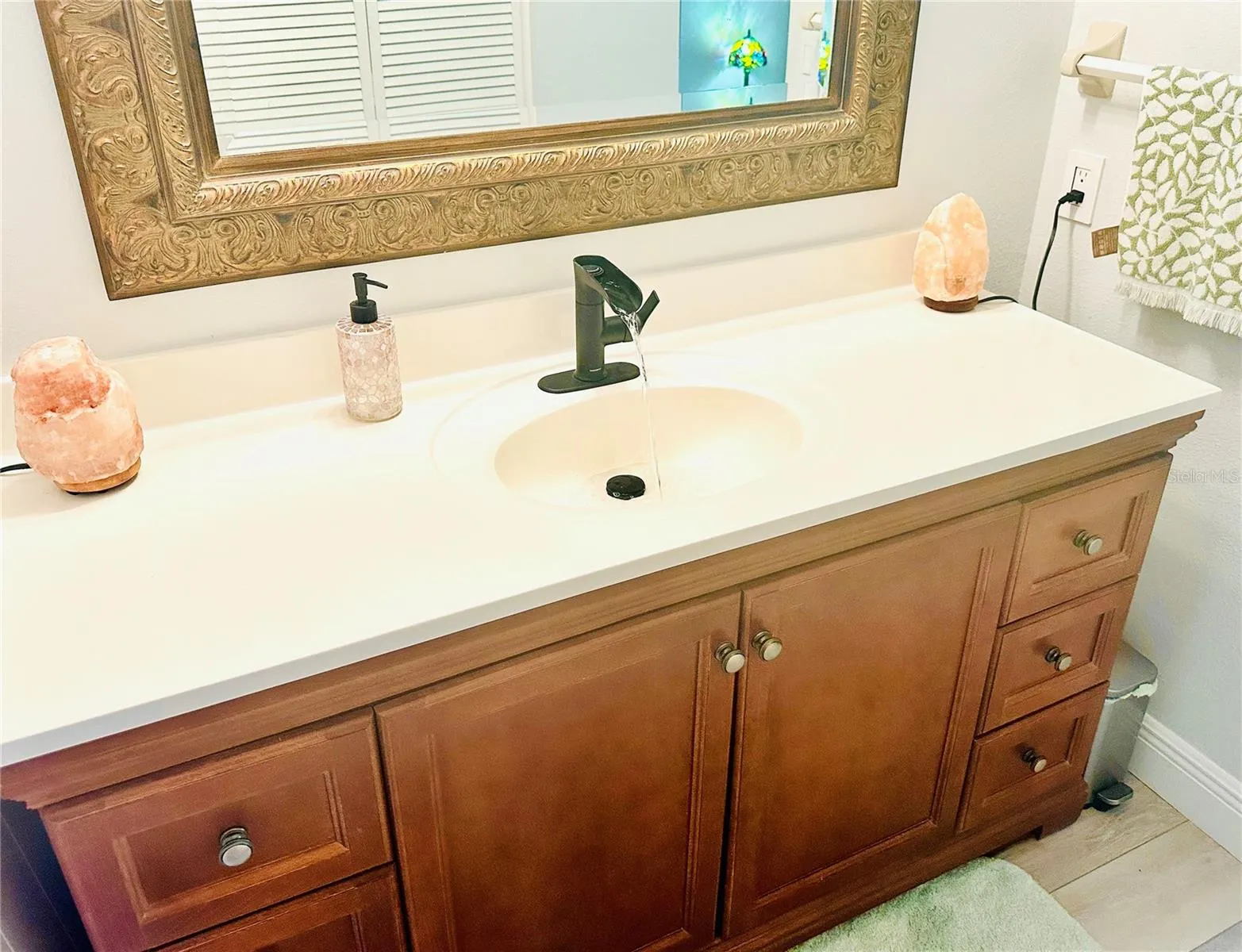 primary bath large storage vanity and sink with filtered water faucet
