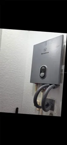 TANKLESS HOT WATER HEATER