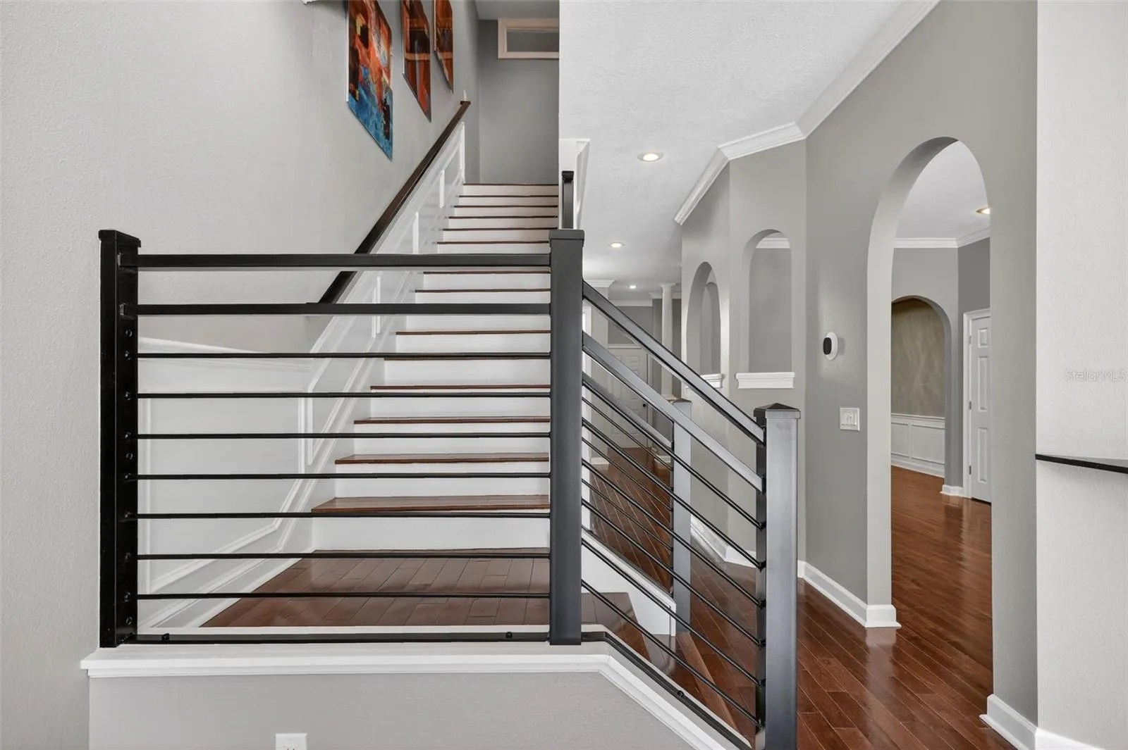 Beautiful stairwell leading to 2nd floor of home