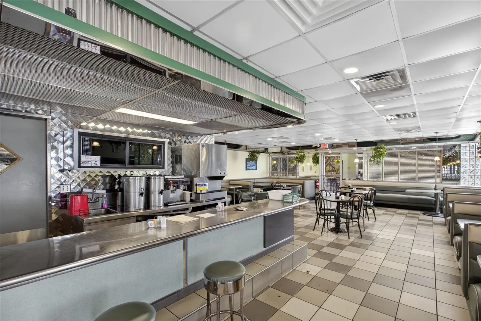 Turnkey diner interior with established dining layout included in restaurant and real estate sale.