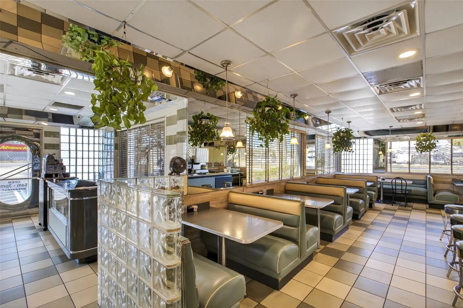 Turnkey diner interior with established dining layout included in restaurant and real estate sale.