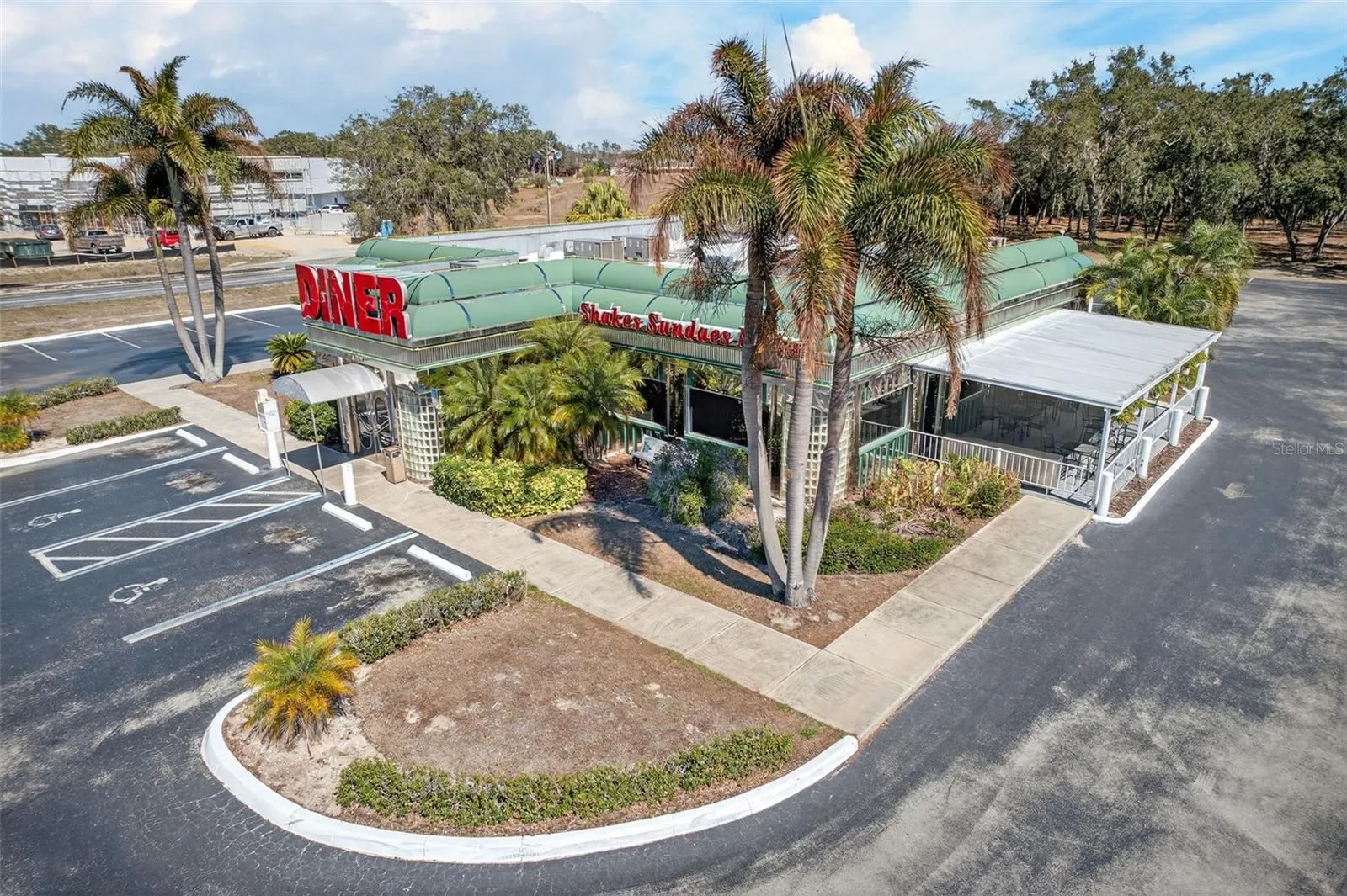 Ample on-site surface parking supporting restaurant operations and future commercial expansion.