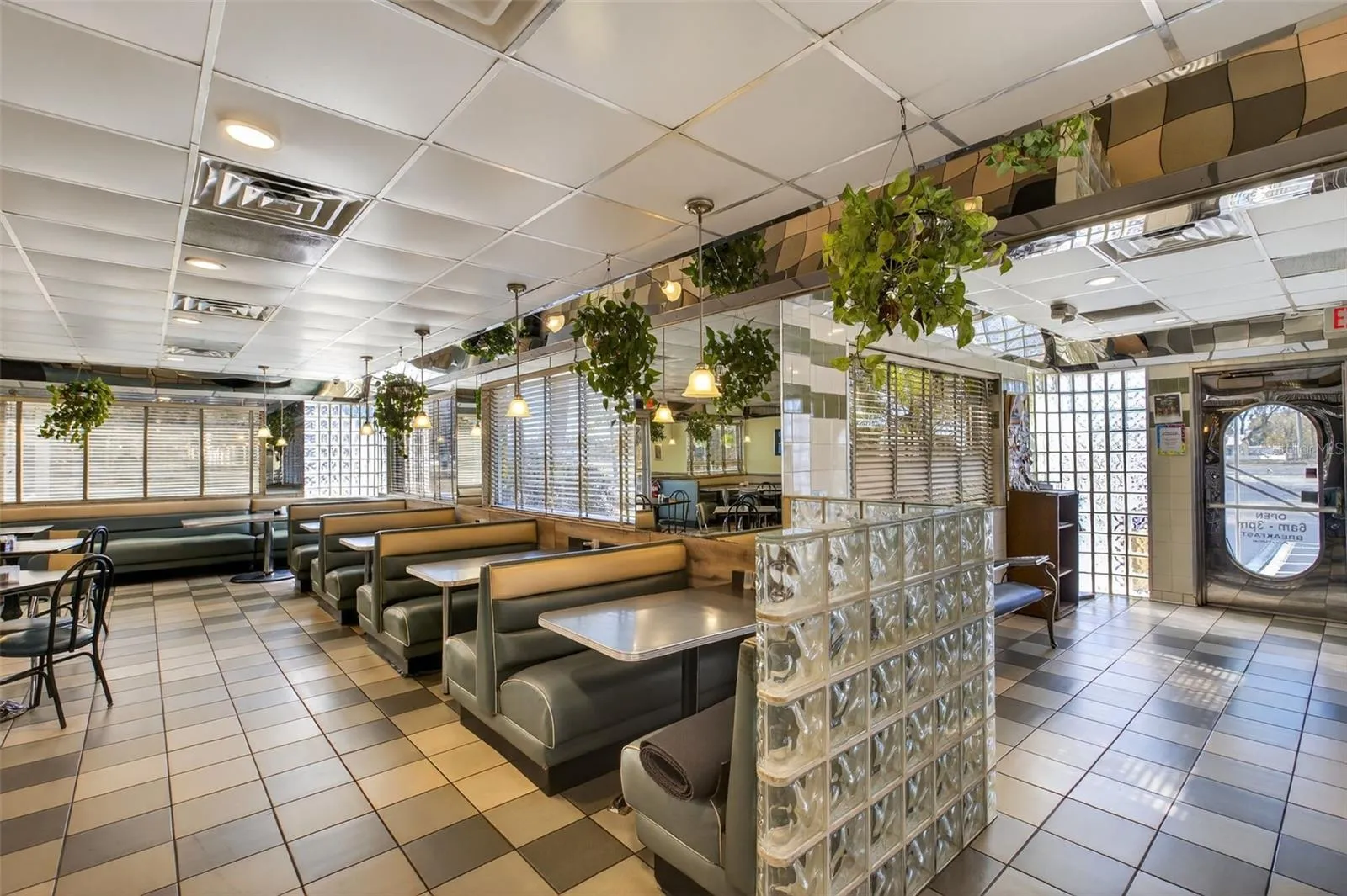 Turnkey diner interior with established dining layout included in restaurant and real estate sale.