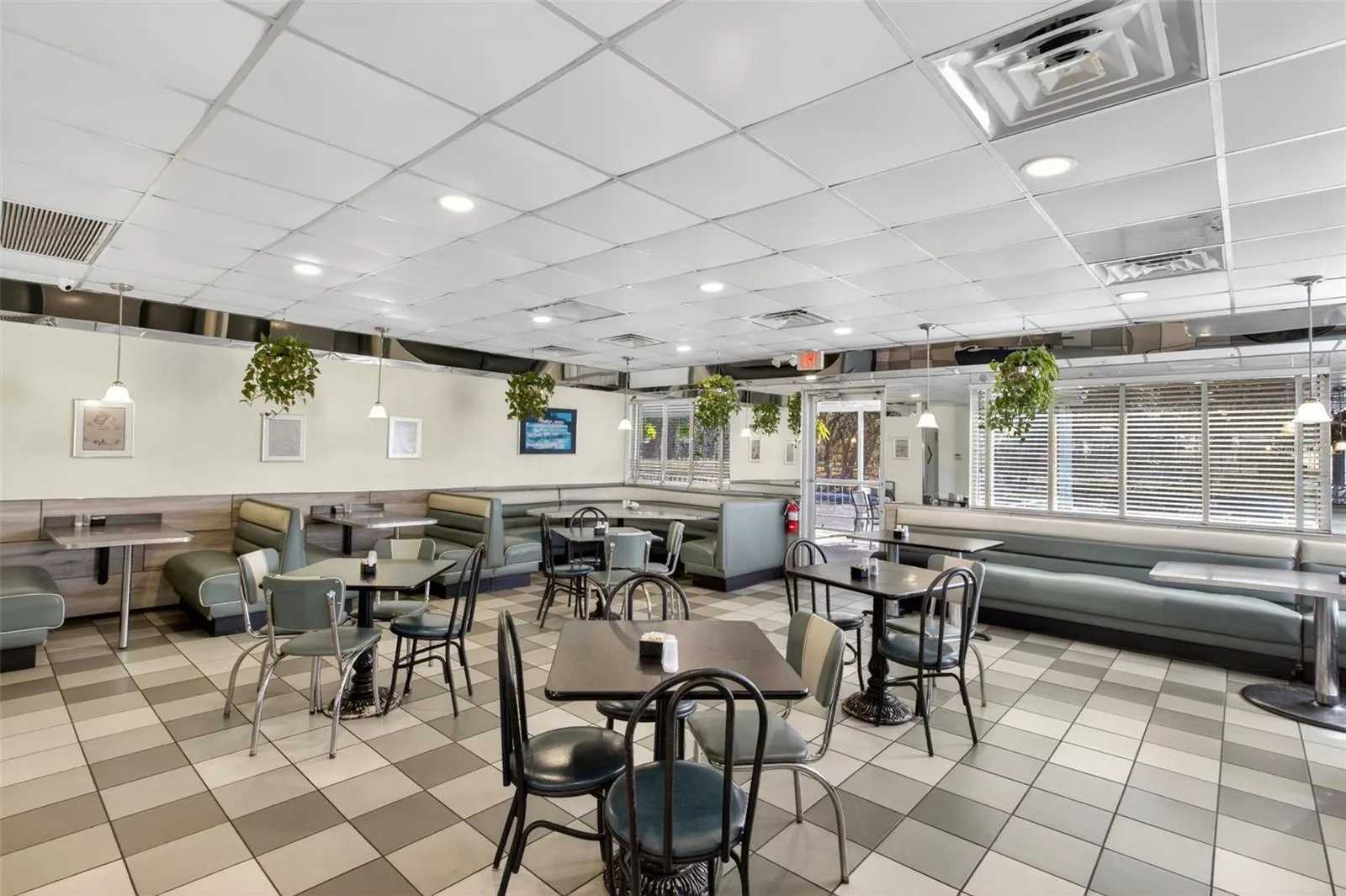 Turnkey diner interior with established dining layout included in restaurant and real estate sale.