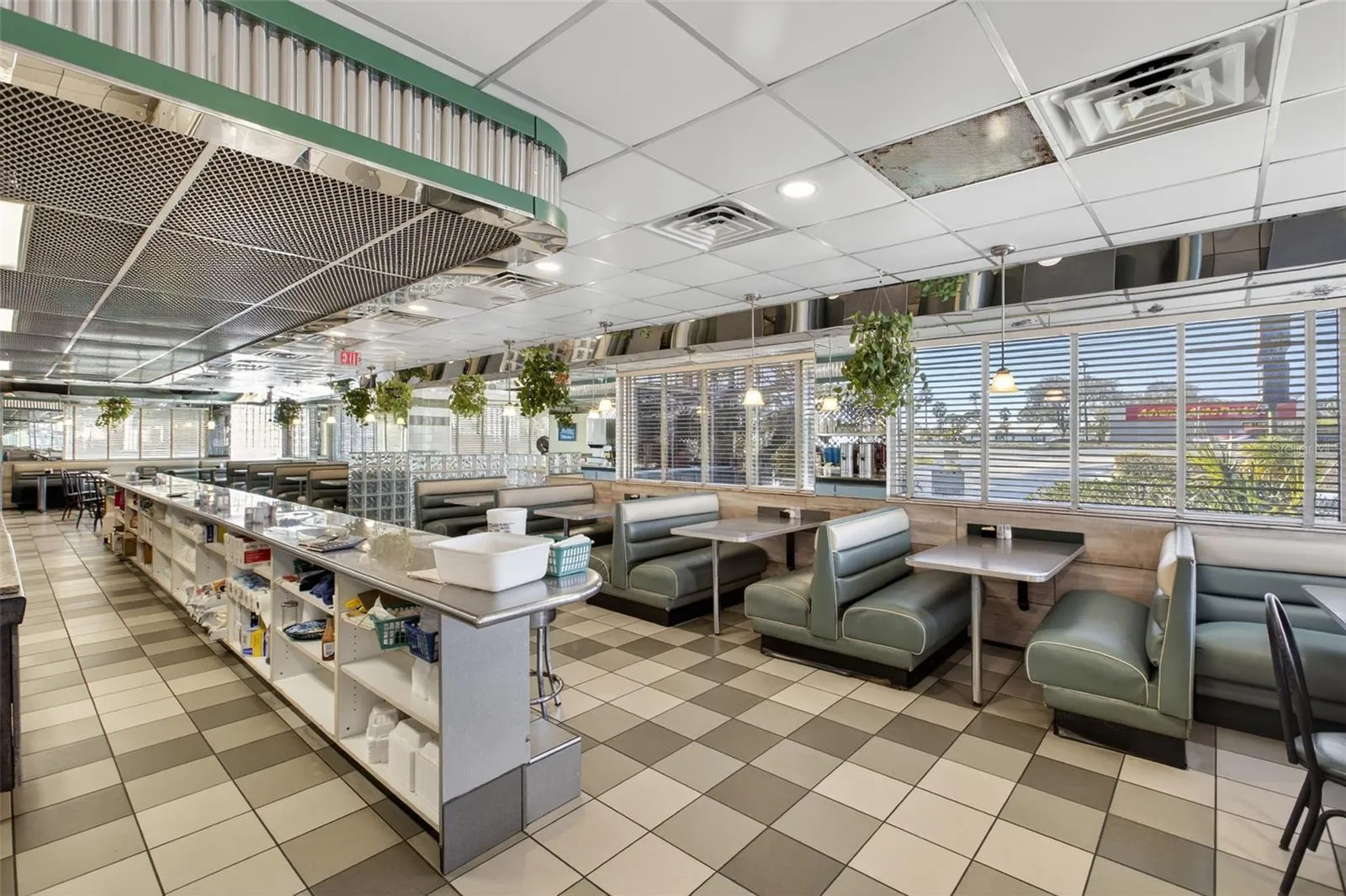 Turnkey diner interior with established dining layout included in restaurant and real estate sale.