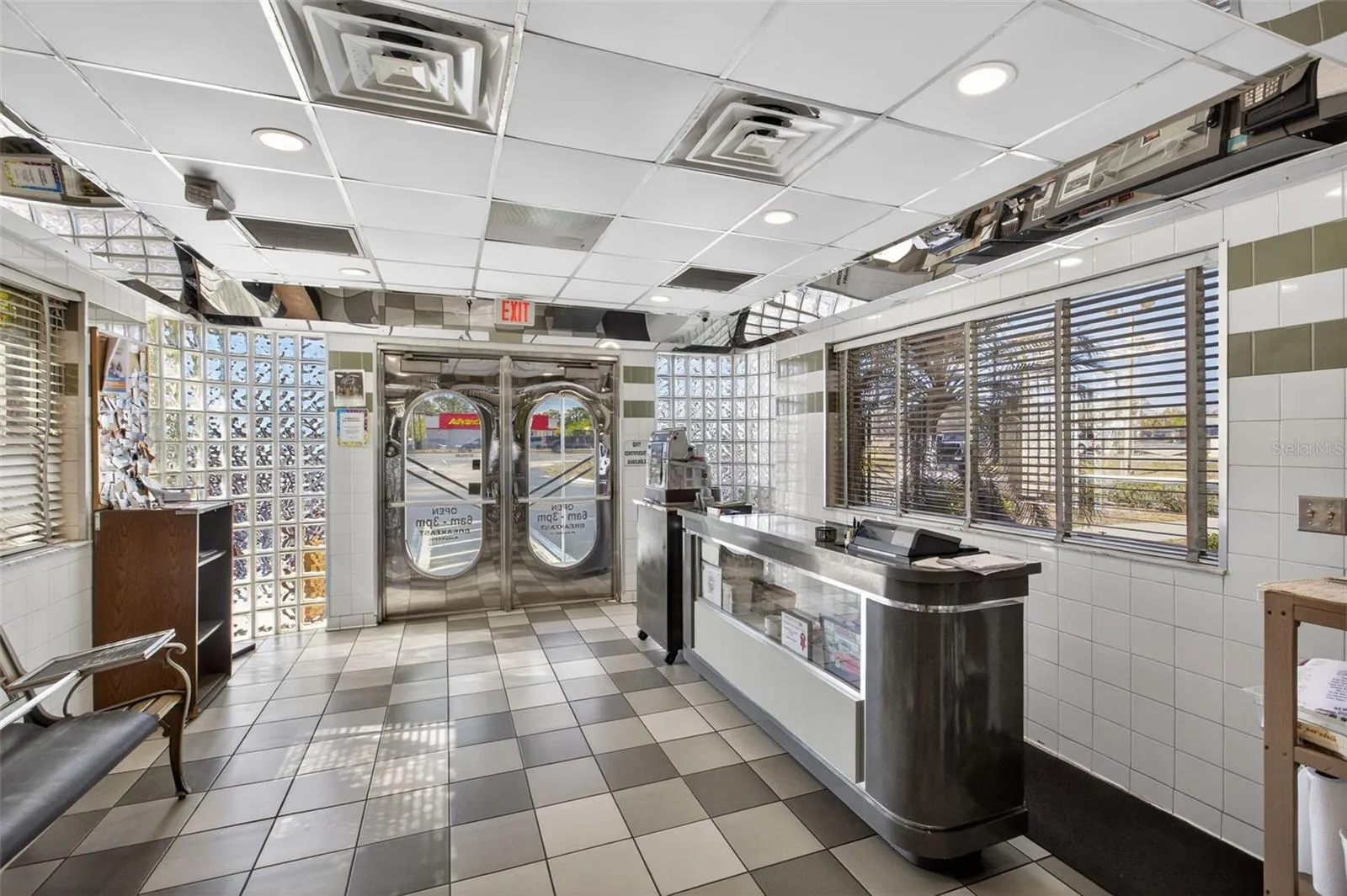 Turnkey diner interior with established dining layout included in restaurant and real estate sale.