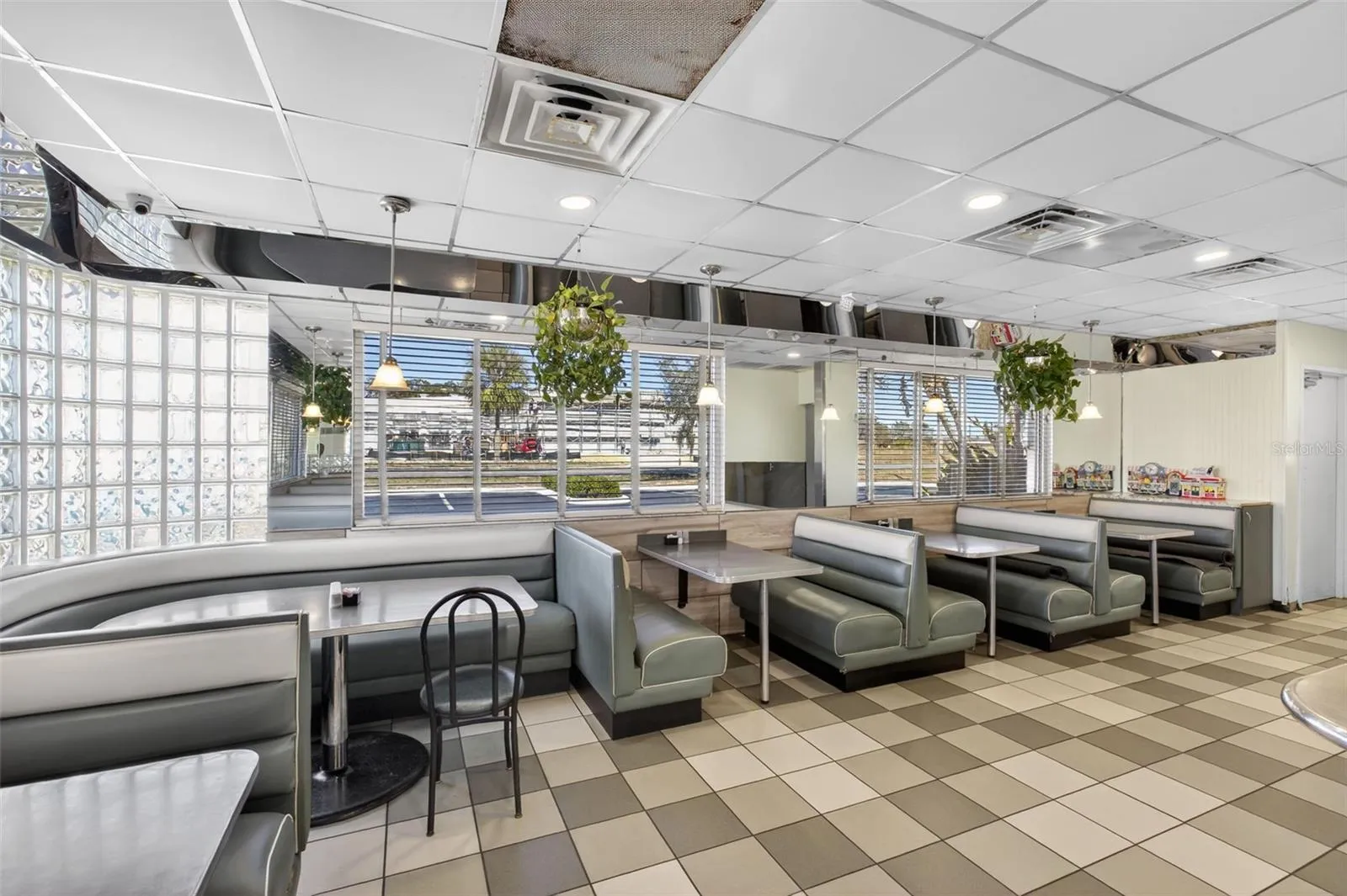 Turnkey diner interior with established dining layout included in restaurant and real estate sale.