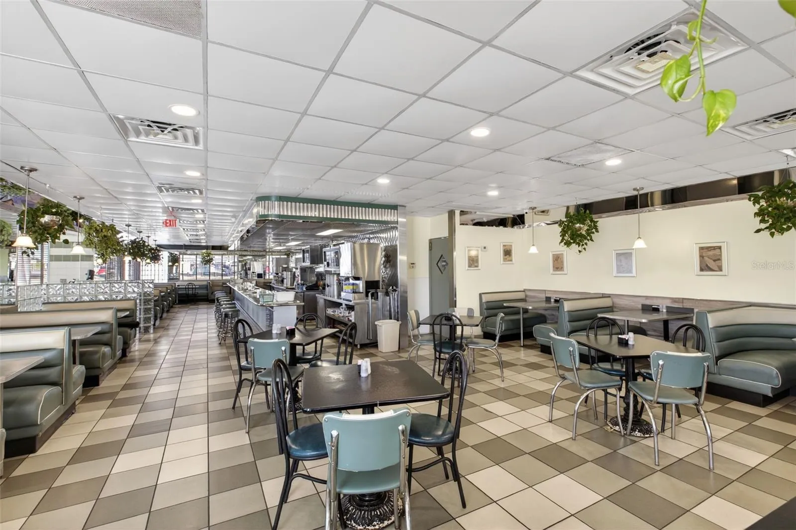 Turnkey diner interior with established dining layout included in restaurant and real estate sale.