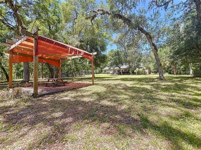 SHADED SITTING AREA SOUTH OF THE HOME