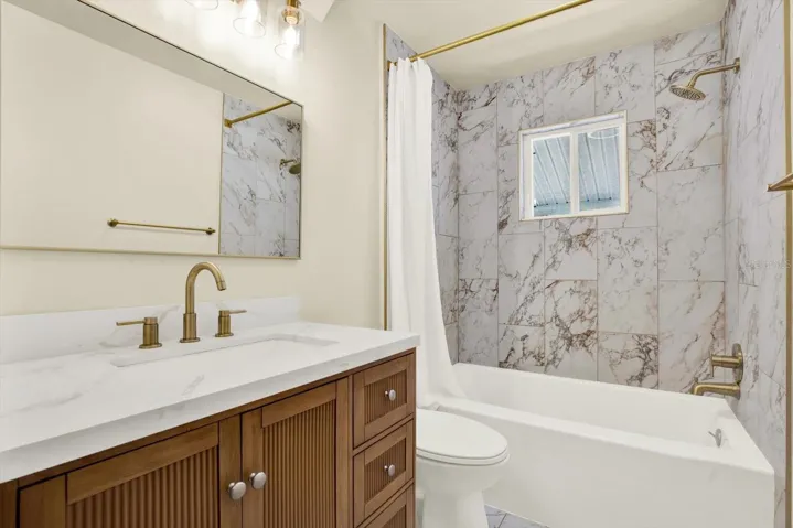 Fully Refreshed Guest Bathroom. New tile, new paint and new vanity.