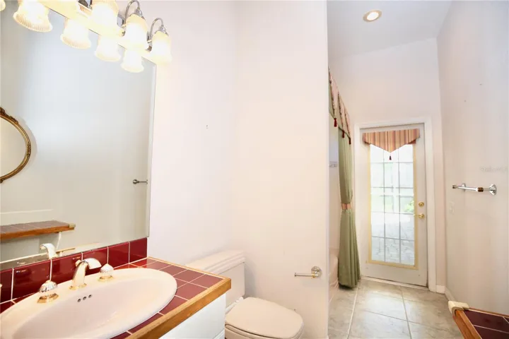 3rd bedroom bathroom with full tub and shower