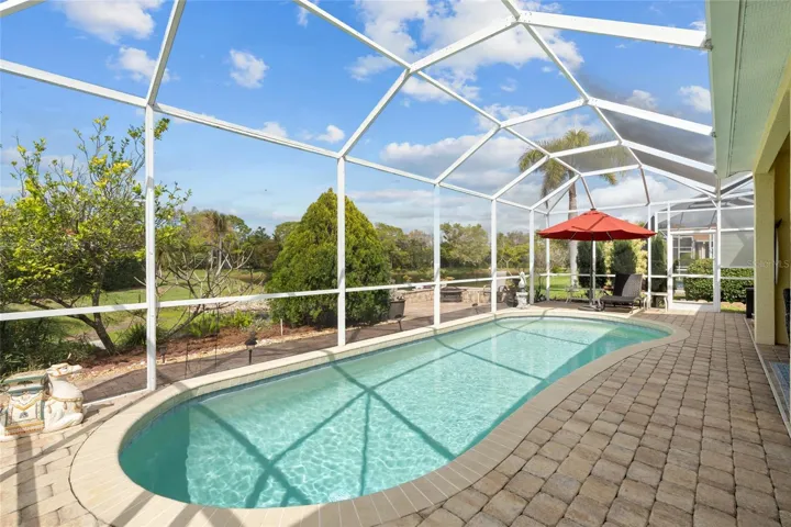 Pool with view of pond