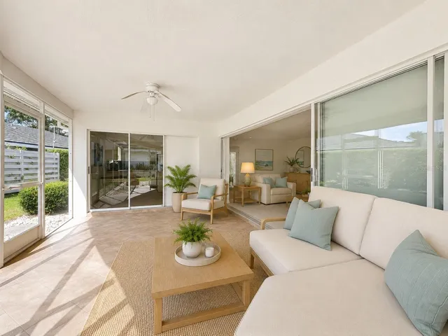Fully enclosed lanai perfect for the Florida Lifestyle,A Patio that extends your living space comfortable for enjoyable relaxing moments.