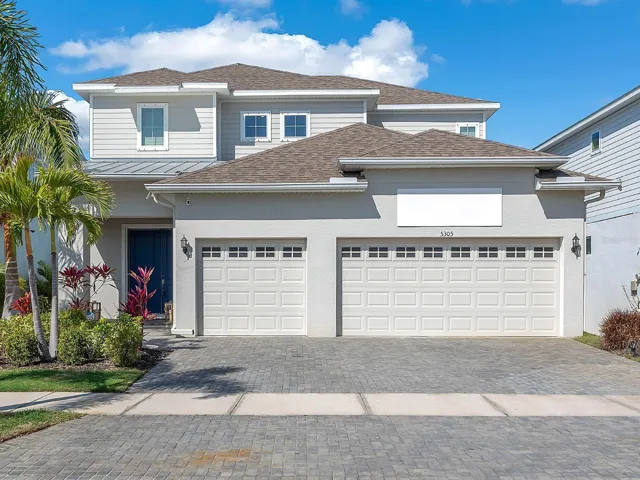 4-bedroom, 3.5-bath waterfront residence with a bonus room and your own private boat dock and sparkling saltwater pool.