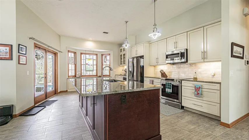 Large open kitchen with huge Island Bar seating space