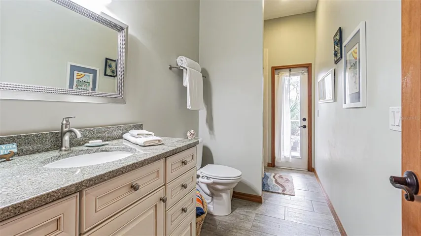 Guest Bath - Pool Bath Same Granite as Kitchen and Primary Bath