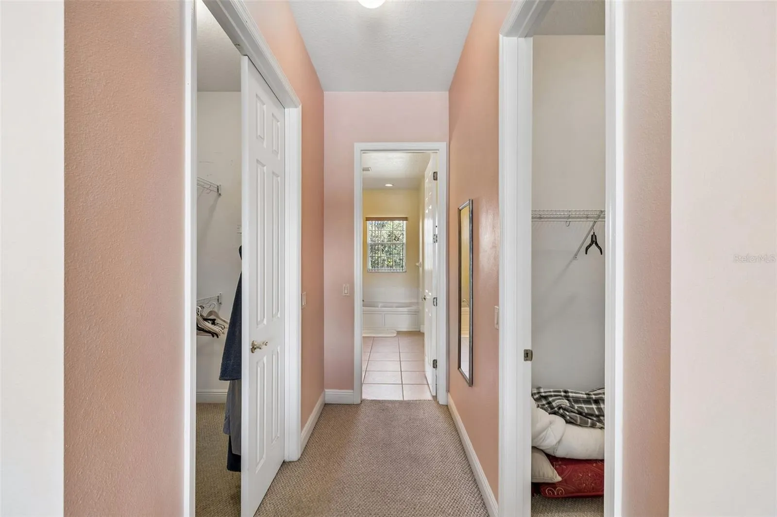 Closets into the primary bedroom en-suite Bath