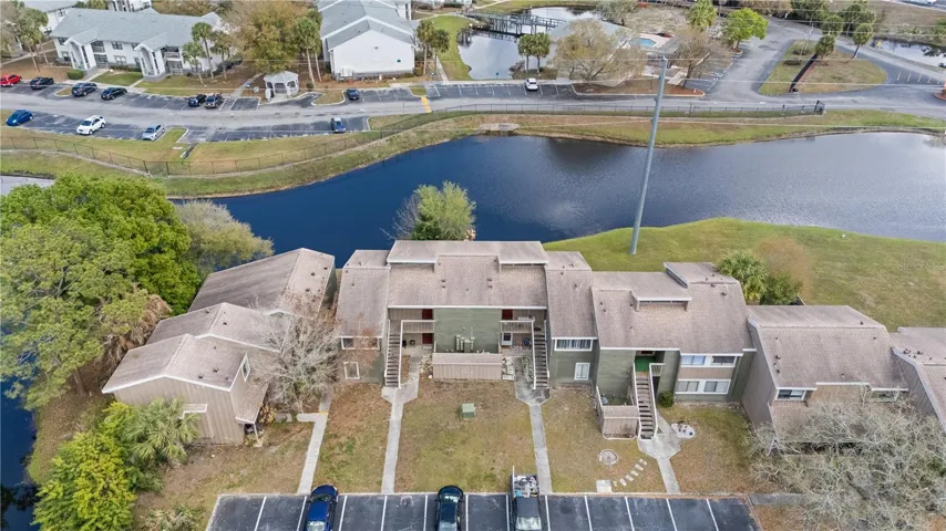 Aerial View of Building and Pond View in Back