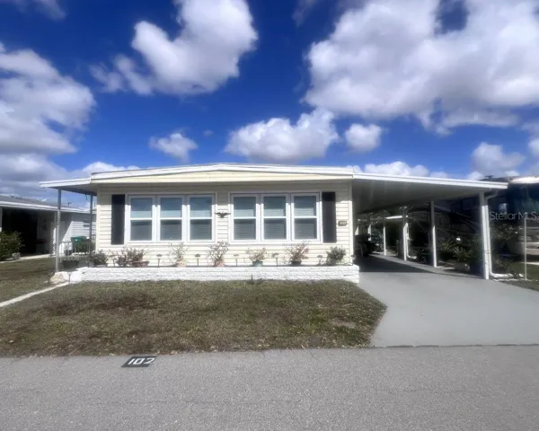 Front of home steps to clubhouse and pool