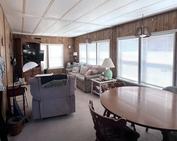 Front enclosed Florida Room new vinyl windows