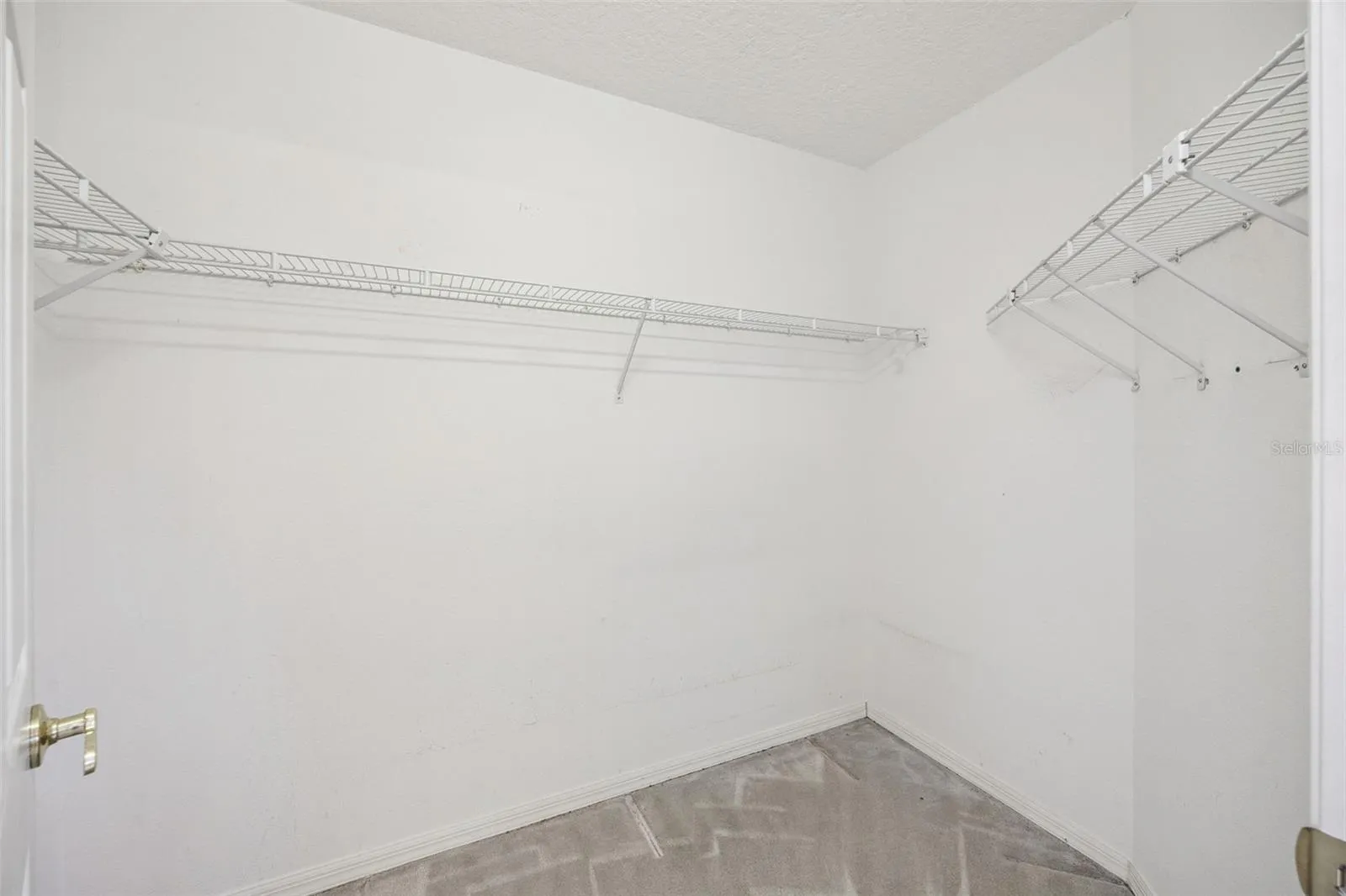 Primary Bedroom Walk in Closet