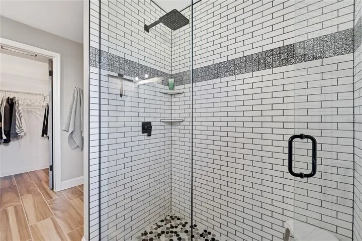 Primary Shower and Walk-in closet