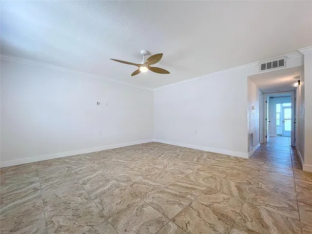 Large living room is inviting and full of natural light.