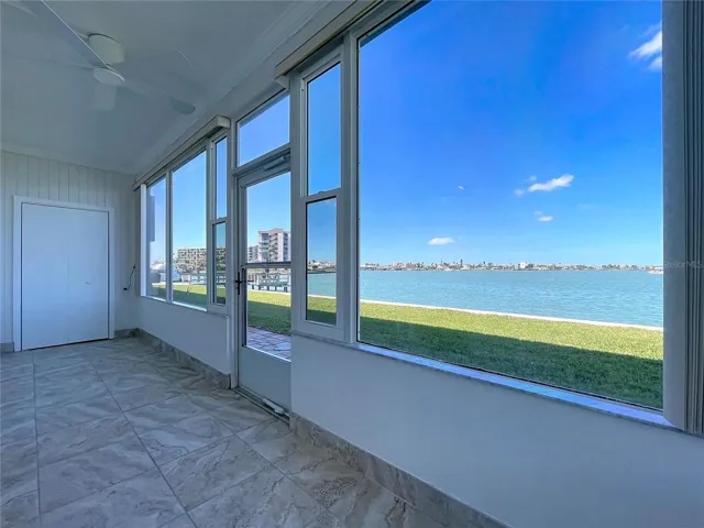 The enclosed lanai is a great space that adds room to the condo where you feel like you are taking the outside in with you.