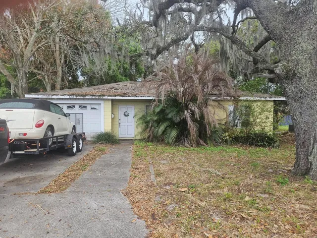 Right om Eau Gallie Blvd, this Professional/Residential Property has tremendous potential!