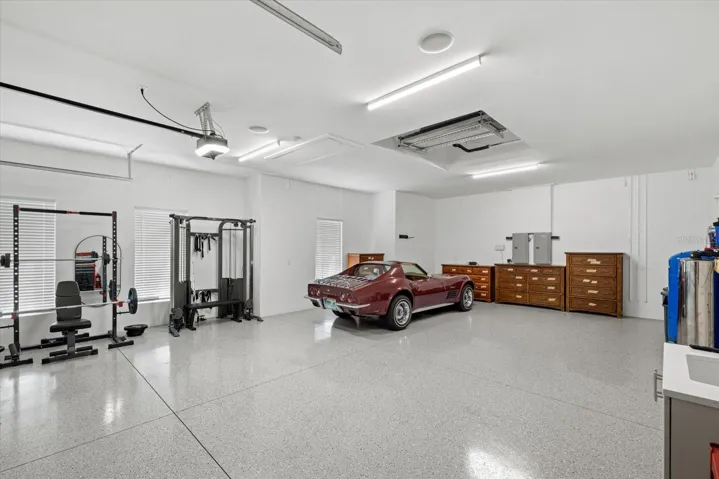 Expansive 8-car garage with gym (included if buyer desires)!