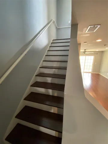 Stairs leading to bedrooms from main floor