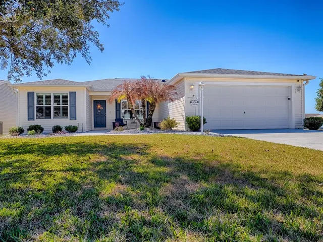 BOND PAID! TURNKEY! Don’t miss this beautifully maintained 3-bedroom, 2-bath Amarillo ideally situated on a desirable corner lot with a 2-car garage and a charming peek-a-boo water view from the elevated lanai in the village of Amelia.