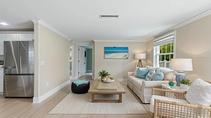 Virtually Staged - open family room with new flooring