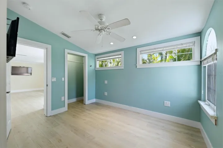 Primary bedroom with volume ceilings & en suite bath!