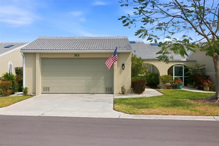 Unit 311 located in the heart center of the community with a beautiful pond view and little to no traffic noise.  Spacious two car garage and private entrance courtyard.