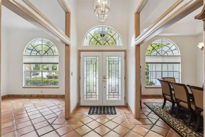 Beautiful brand new front doors add to the charm of this home.