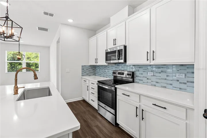 Kitchen with soft-close cabinets and drawers