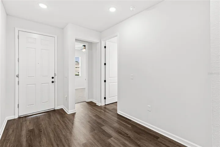 Home has LVP, 8' doors, and 9'4