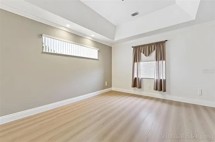 Primary bedroom virtually staged.