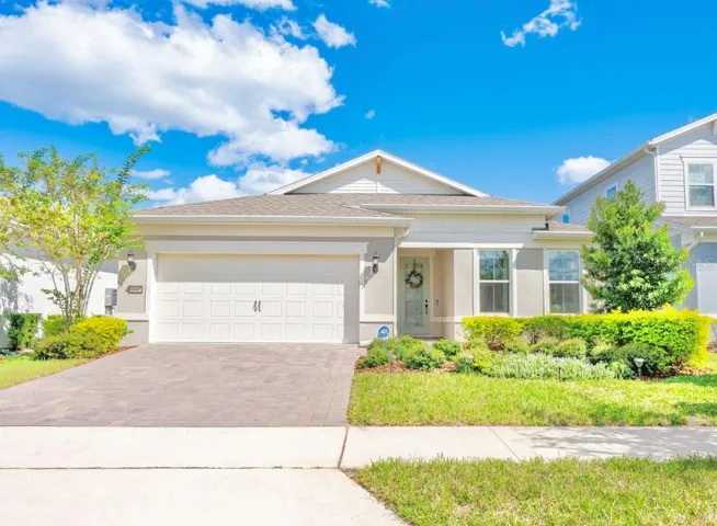 Welcome to the pinnacle of single story living in the sought-after gated community - Isles of Lake Nona!