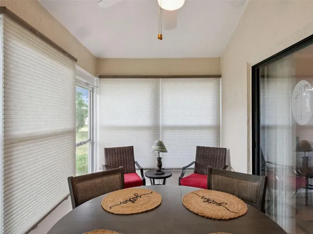 THE LANAI HAS DOUBLE-HUNG WIDNOWS WITH SCREENS.  (Furniture does not convey)