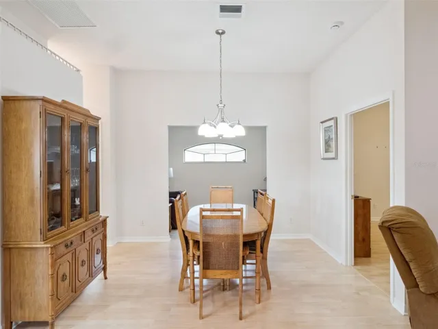 THE DINNG ROOM LOOKING TOWARD THE FLEX/BONUS ROOM